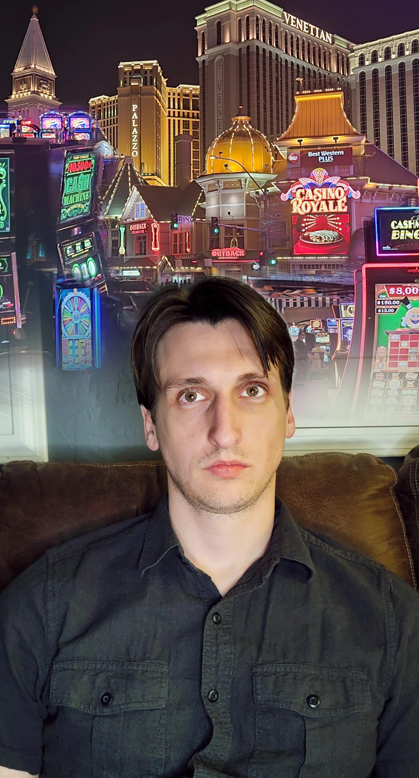 A man with a blank stare and casino lights floating above his head